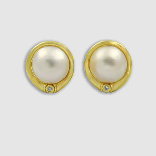 Creolen aus 750 Gelbgold mit 2 Brill. zus. ca. 0,014 ct W/si