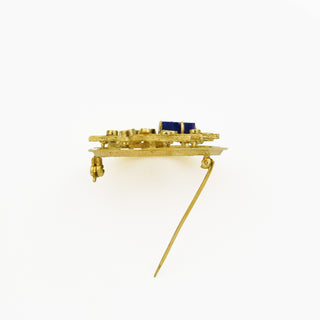 Brosche aus Gelbgold mit Lapislazuli
