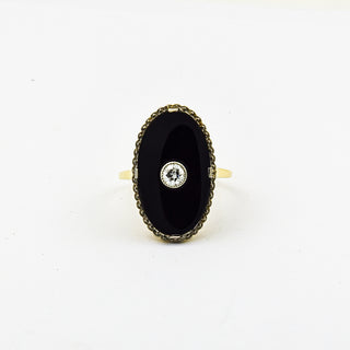 Art Déco Ring aus Gelb- und Weißgold mit Onyx und Diamant