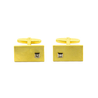 Manschettenknöpfe aus Gelb- und Weißgold mit Diamant