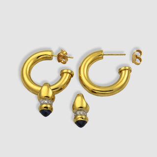 Klassische Creolen aus Gelbgold mit Saphir.