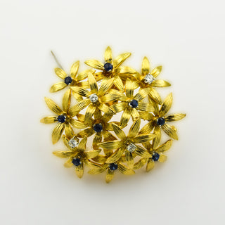 Anhänger/Brosche Blumen aus 750 Gelb- und Weißgold mit Saphir und Brillant, nachhaltiger second hand Schmuck perfekt aufgearbeitet