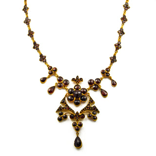 Collier aus Metall mit Granat, nachhaltiger second hand Schmuck perfekt aufgearbeitet