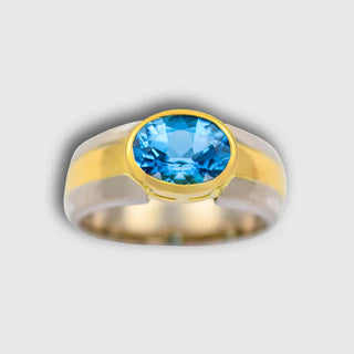 Ring aus Gelb- und Weissgold mit Tansanit aus zweiter Hand