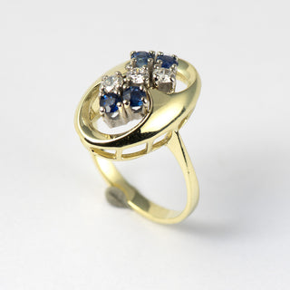 Ring aus Gelb- und Weißgold mit Saphir und Diamant