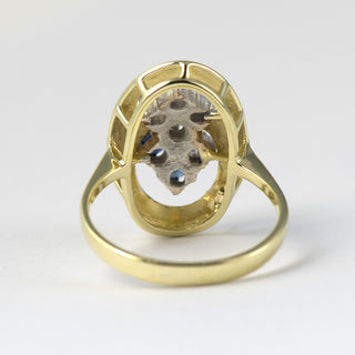 Ring aus Gelb- und Weißgold mit Saphir und Diamant