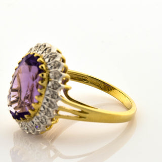 Ring aus Gelb- und Weißgold mit Amethyst und Diamant