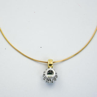 Christ Kette mit Smaragdanhänger aus Gelb- und Weißgold mit Brillant