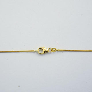Christ Kette mit Smaragdanhänger aus Gelb- und Weißgold mit Brillant