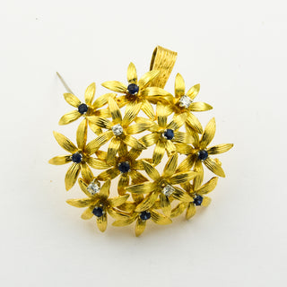 Anhänger/Brosche Blumen aus 750 Gelb- und Weißgold mit Saphir und Brillant, nachhaltiger second hand Schmuck perfekt aufgearbeitet