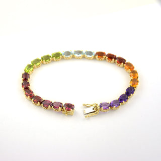 Granatarmband aus 585 Gelbgold mit Amethyst und Peridot, nachhaltiger second hand Schmuck perfekt aufgearbeitet