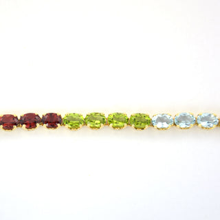 Granatarmband aus 585 Gelbgold mit Amethyst und Peridot, nachhaltiger second hand Schmuck perfekt aufgearbeitet