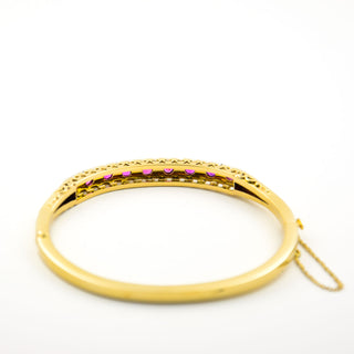 Rubinarmreif aus 585 Gelb- und Weißgold, nachhaltiger second hand Schmuck perfekt aufgearbeitet