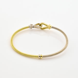 Armreif aus 585 Gelb- und Weißgold, nachhaltiger second hand Schmuck perfekt aufgearbeitet