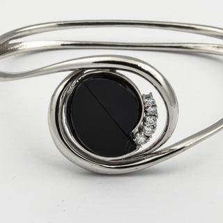 Armreif aus 750 Weißgold mit Onyx und Brillant, nachhaltiger second hand Schmuck perfekt aufgearbeitet