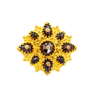 Granatbrosche aus 585 Gelbgold, nachhaltiger second hand Schmuck perfekt aufgearbeitet