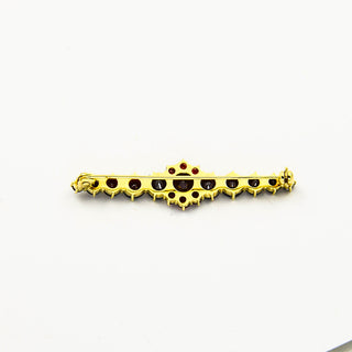 Granatbrosche aus 333 Gelbgold, nachhaltiger second hand Schmuck perfekt aufgearbeitet
