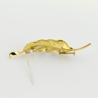 Brosche Feder aus 750 Gelbgold, nachhaltiger second hand Schmuck perfekt aufgearbeitet