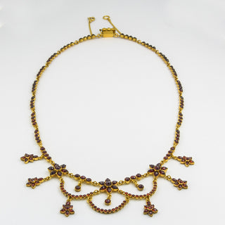 Collier aus Metall mit Granat, nachhaltiger second hand Schmuck perfekt aufgearbeitet