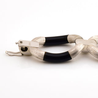 Gliederarmband aus 750 Weißgold mit Onyx, nachhaltiger second hand Schmuck perfekt aufgearbeitet