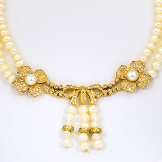 Perlenkette  mit Schließe und Mittelteil aus 750 Gelbgold mit Brillant, nachhaltiger second hand Schmuck perfekt aufgearbeitet