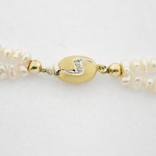 Perlenkette mit Granat und Schließe aus Gelb- und Weißgold mit Diamant, nachhaltiger second hand Schmuck perfekt aufgearbeitet