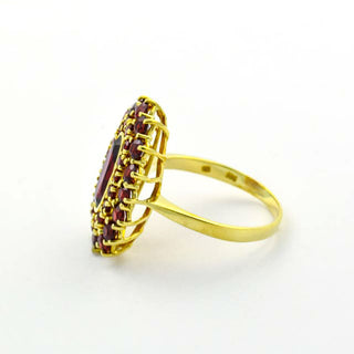 Granatring aus 585 Gelbgold, nachhaltiger second hand Schmuck perfekt aufgearbeitet