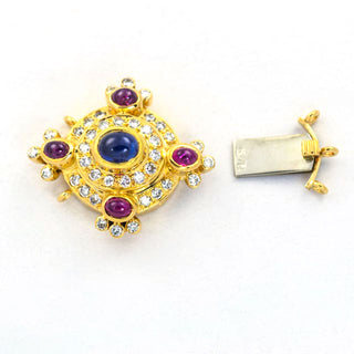 Saphirschließe aus 750 Gelbgold mit Rubin und Brillant, nachhaltiger second hand Schmuck perfekt aufgearbeitet