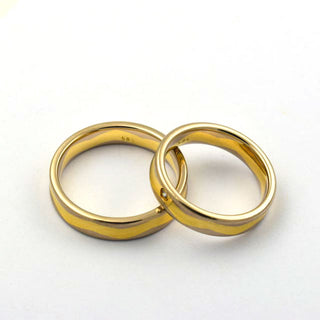 Trauringe aus 585 Gelb- und Weißgold mit Brillant, nachhaltiger second hand Schmuck perfekt aufgearbeitet