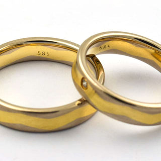 Trauringe aus 585 Gelb- und Weißgold mit Brillant, nachhaltiger second hand Schmuck perfekt aufgearbeitet