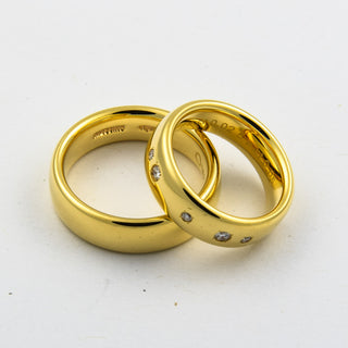 Niessing Trauringe Oval aus 750 Gelbgold mit Brillant, nachhaltiger second hand Schmuck perfekt aufgearbeitet