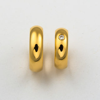 Niessing Trauringe halbrund/bombiert aus 750 Gelbgold mit Brillant, nachhaltiger second hand Schmuck perfekt aufgearbeitet