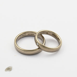 Niessing Trauringe Oval aus 750 Graugold mit Brillant, nachhaltiger second hand Schmuck perfekt aufgearbeitet