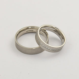 Niessing Trauringe rechteck/bombiert aus 950 Platin mit Brillant, nachhaltiger second hand Schmuck perfekt aufgearbeitet