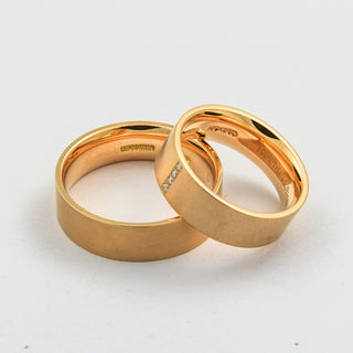 Niessing Trauringe rechteck/bombiert aus 750 Roségold mit Brillant, nachhaltiger second hand Schmuck perfekt aufgearbeitet