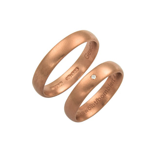 Niessing Trauringe gewölbt/bombiert aus 585 Rotgold mit Brillant, nachhaltiger second hand Schmuck perfekt aufgearbeitet