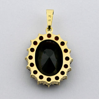 Anhänger aus 333 Gelbgold mit Granat, nachhaltiger second hand Schmuck perfekt aufgearbeitet