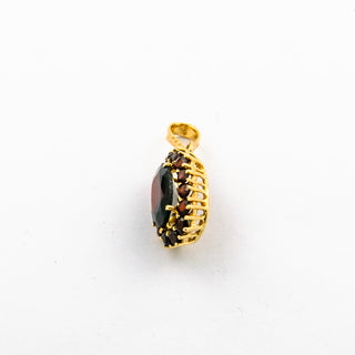Anhänger aus 750 Gelbgold mit Granat, nachhaltiger second hand Schmuck perfekt aufgearbeitet