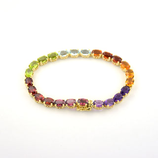 Granatarmband aus 585 Gelbgold mit Amethyst und Peridot, nachhaltiger second hand Schmuck perfekt aufgearbeitet