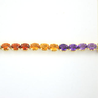 Granatarmband aus 585 Gelbgold mit Amethyst und Peridot, nachhaltiger second hand Schmuck perfekt aufgearbeitet