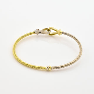 Armreif aus 585 Gelb- und Weißgold, nachhaltiger second hand Schmuck perfekt aufgearbeitet