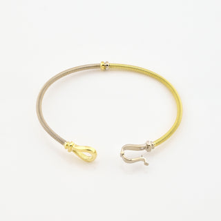Armreif aus 585 Gelb- und Weißgold, nachhaltiger second hand Schmuck perfekt aufgearbeitet