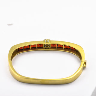 Granatarmreif aus 585 Gelbgold mit Brillant, nachhaltiger second hand Schmuck perfekt aufgearbeitet