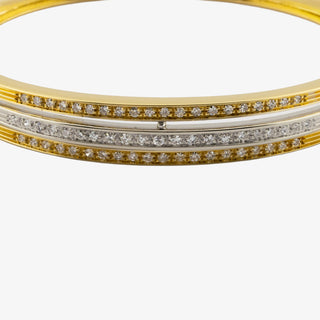 Armreif aus 750 Gelb- und Weißgold mit Diamant, nachhaltiger second hand Schmuck perfekt aufgearbeitet