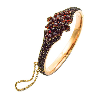 Granatarmreif aus Metall, nachhaltiger second hand Schmuck perfekt aufgearbeitet