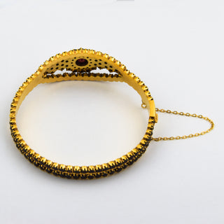 Granatarmreif aus 835 Silber vergoldet, nachhaltiger second hand Schmuck perfekt aufgearbeitet