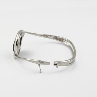 Armreif aus 750 Weißgold mit Onyx und Brillant, nachhaltiger second hand Schmuck perfekt aufgearbeitet