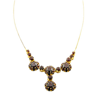 Collier aus 333 Gelbgold mit Granat, nachhaltiger second hand Schmuck perfekt aufgearbeitet