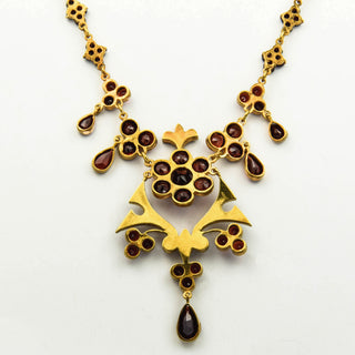 Collier aus Metall mit Granat, nachhaltiger second hand Schmuck perfekt aufgearbeitet