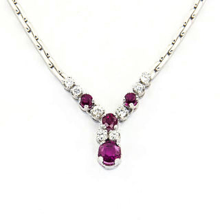 Rubincollier aus 585 Weißgold mit Brillant, nachhaltiger second hand Schmuck perfekt aufgearbeitet